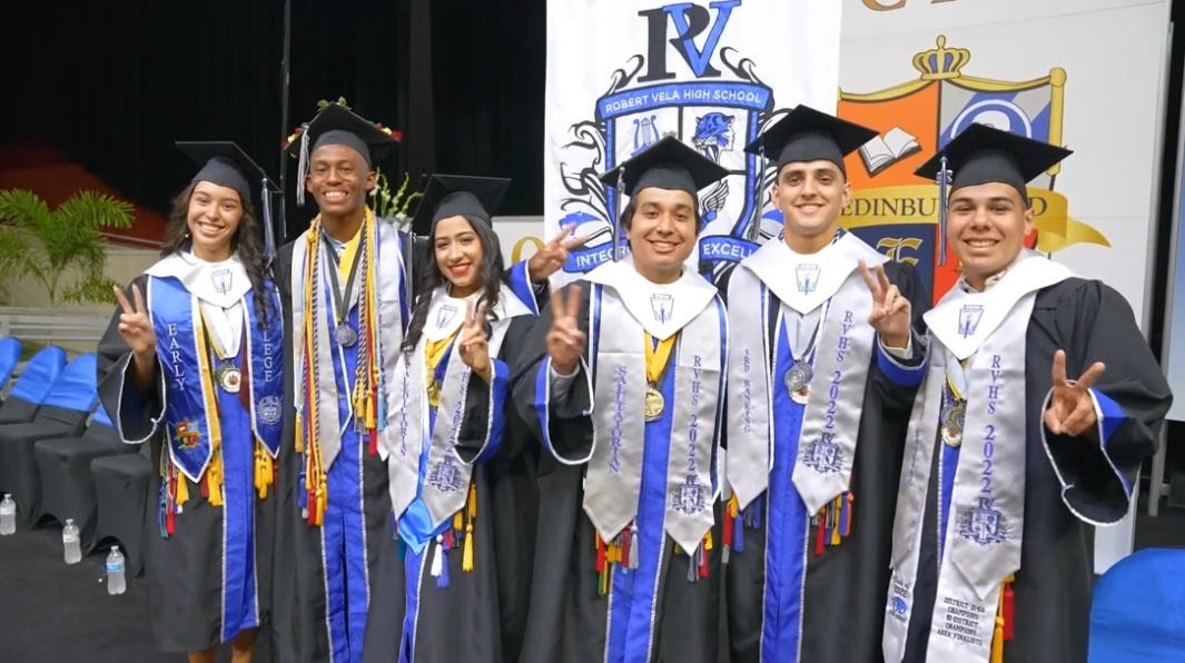 Graduates celebrating at an Edinburg commencement ceremony